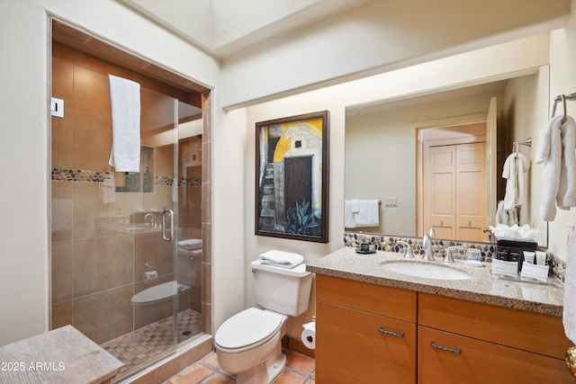 full bathroom featuring toilet, a stall shower, tile patterned floors, and vanity