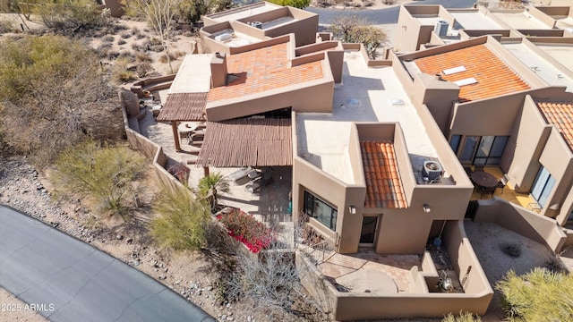 birds eye view of property with a residential view