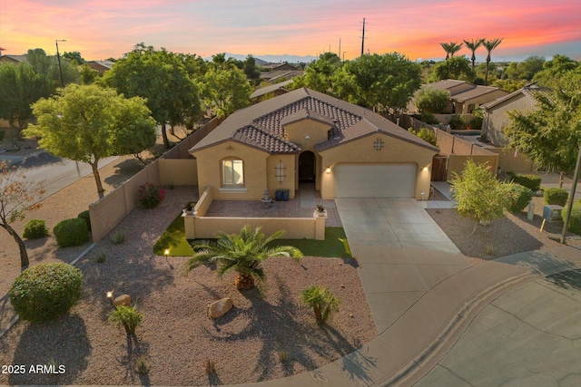 4032 S Santa Rita Pl, Chandler, AZ 85249 - mediterranean / spanish-style home featuring a garage, stucco siding, concrete driveway, and a tiled roof