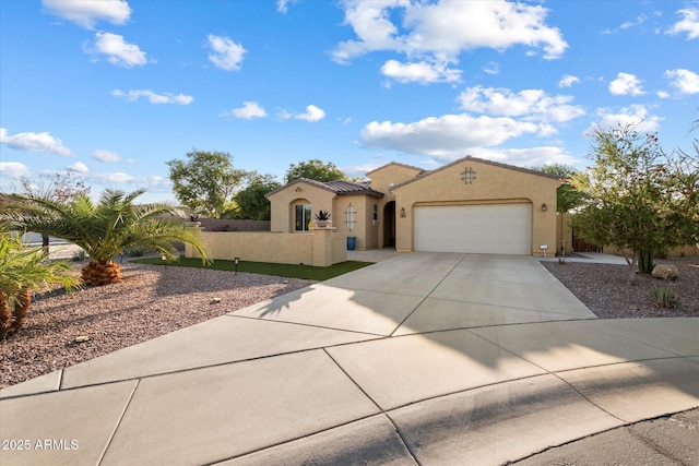 4032 S Santa Rita Pl, Chandler, AZ 85249 - mediterranean / spanish home with stucco siding, an attached garage, concrete driveway, and a tile roof