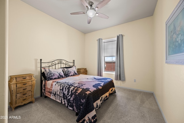 bedroom featuring baseboards, ceiling fan, and carpet flooring