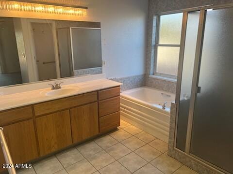 bathroom with tile patterned flooring, a garden tub, vanity, and a shower stall