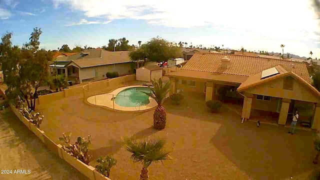 view of swimming pool with a patio area and a fenced in pool