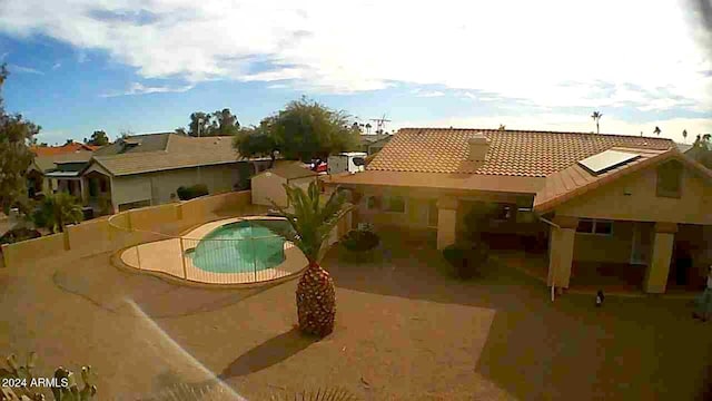 view of pool featuring a patio area and a fenced in pool