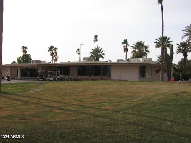 exterior space featuring a front lawn