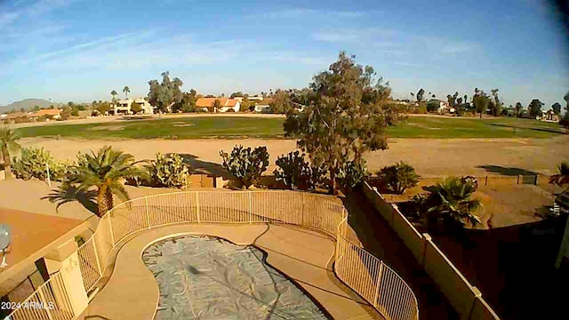 view of property's community with view of golf course