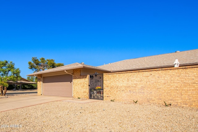 single story home featuring a garage