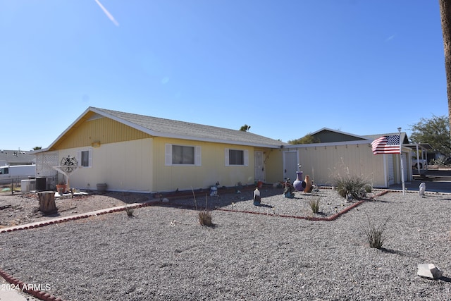 back of house with cooling unit