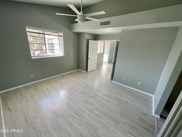 unfurnished bedroom with ceiling fan and light wood-type flooring