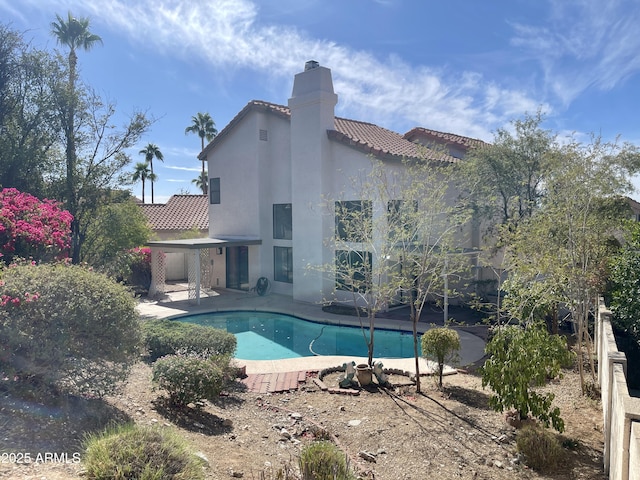 pool with a patio area