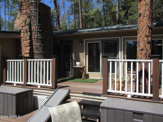 exterior space featuring a wooden deck