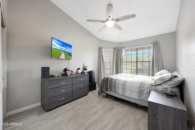 11446 N 109th St, Scottsdale, AZ 85259 - bedroom with lofted ceiling, light wood finished floors, and ceiling fan