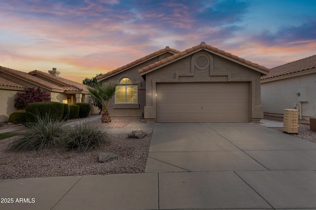 view of front of property with a garage