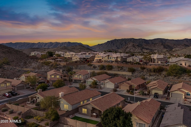 aerial view at dusk with a mountain view