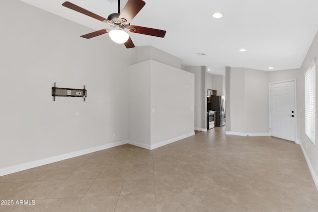 unfurnished living room with ceiling fan and light tile patterned flooring