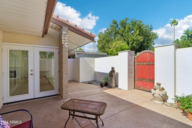 view of patio / terrace featuring french doors