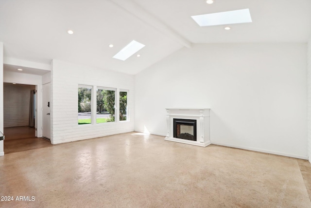 unfurnished living room with high vaulted ceiling, a skylight, and beamed ceiling