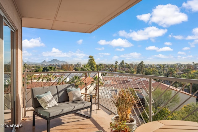 balcony featuring a mountain view