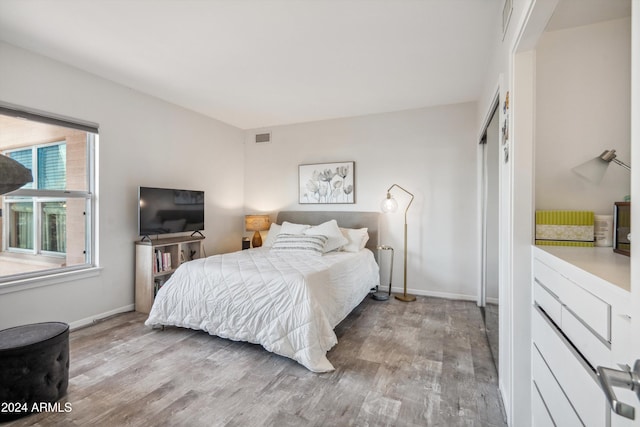 bedroom featuring light wood-type flooring