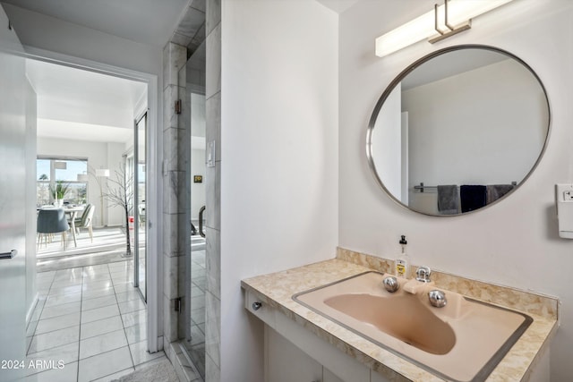 bathroom with vanity and tile patterned floors