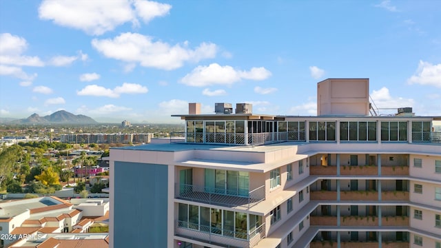 view of building exterior with a mountain view