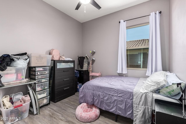 18474 W College Dr, Goodyear, AZ 85395 - bedroom featuring wood finished floors and a ceiling fan