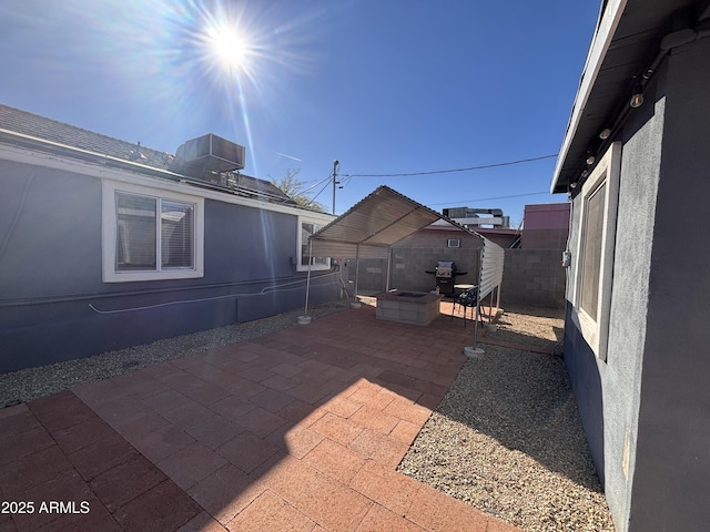 view of patio / terrace with central AC unit