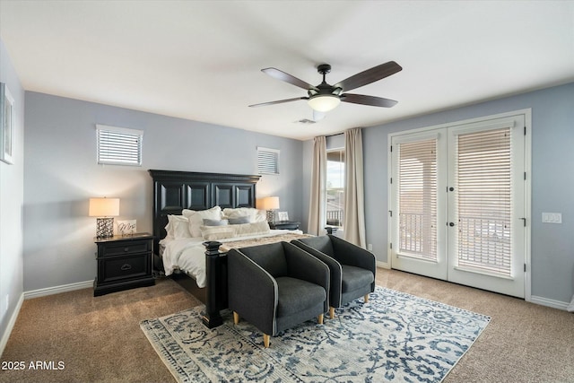 carpeted bedroom featuring access to outside, ceiling fan, and french doors