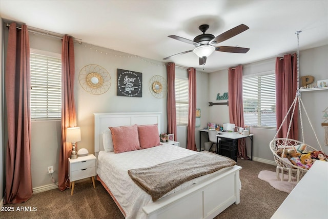 bedroom featuring ceiling fan and dark colored carpet