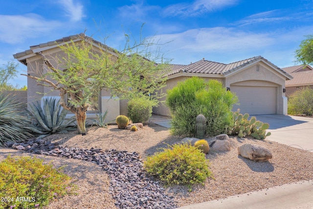 view of front of home with a garage