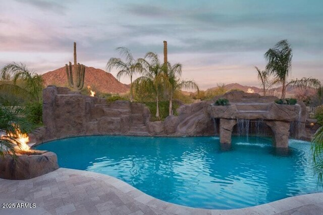 26285 N 89th St, Scottsdale, AZ 85255 - pool at dusk with an outdoor pool and a mountain view