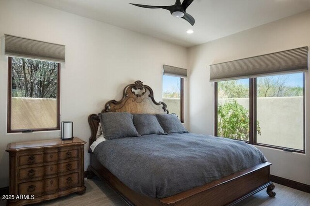 26285 N 89th St, Scottsdale, AZ 85255 - bedroom featuring wood finished floors, multiple windows, recessed lighting, and a ceiling fan