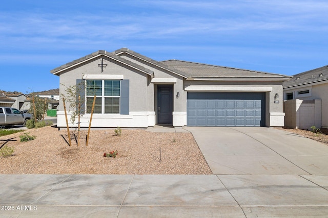 ranch-style home featuring a garage