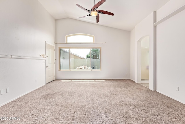 10001 W Potter Dr, Peoria, AZ 85382 - empty room featuring a ceiling fan, vaulted ceiling, arched walkways, carpet, and baseboards