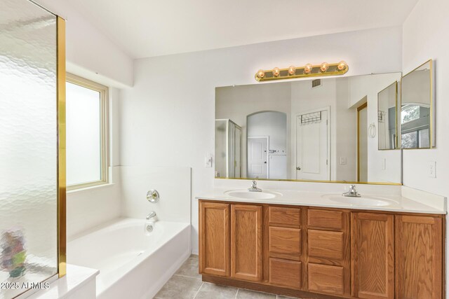 10001 W Potter Dr, Peoria, AZ 85382 - full bathroom featuring tile patterned flooring, a bath, double vanity, and a shower stall