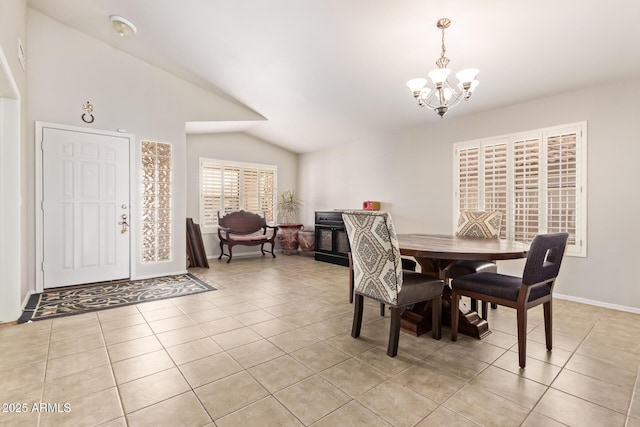 10001 W Potter Dr, Peoria, AZ 85382 - dining space with a chandelier, light tile patterned flooring, lofted ceiling, and baseboards