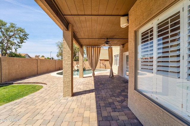 view of patio / terrace featuring a fenced backyard and ceiling fan