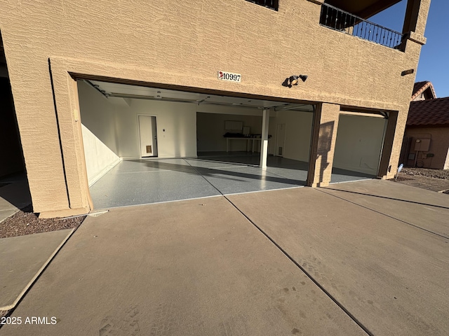 garage featuring driveway