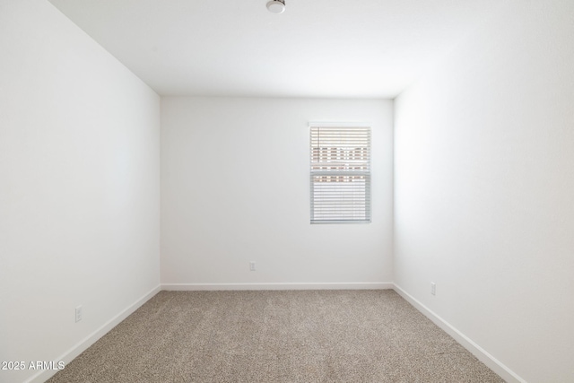 empty room with carpet floors