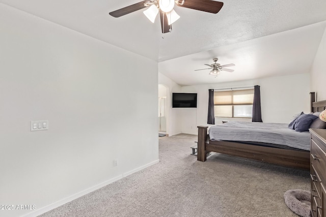 bedroom with lofted ceiling, light colored carpet, and ceiling fan