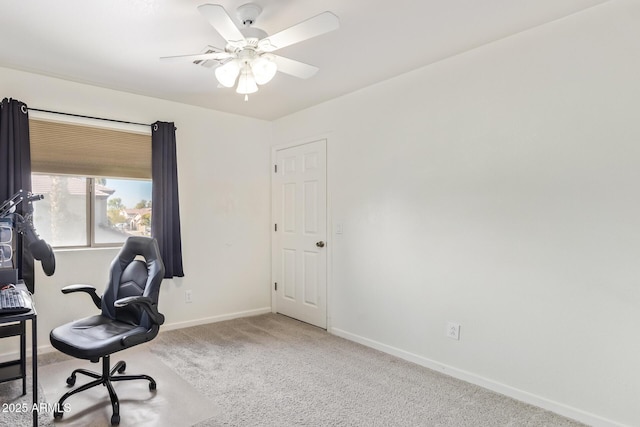 carpeted office with ceiling fan