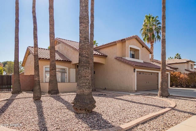 view of front of property with a garage