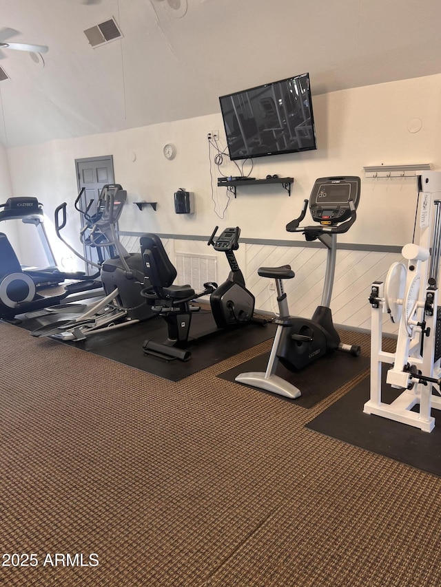 workout area featuring a ceiling fan and visible vents