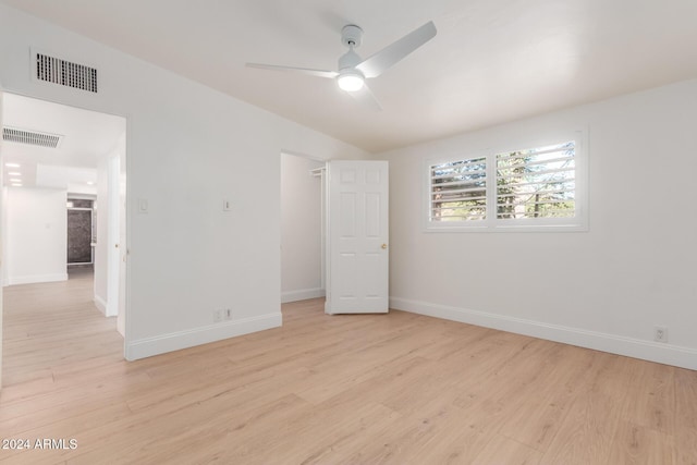 empty room featuring ceiling fan and light hardwood / wood-style flooring