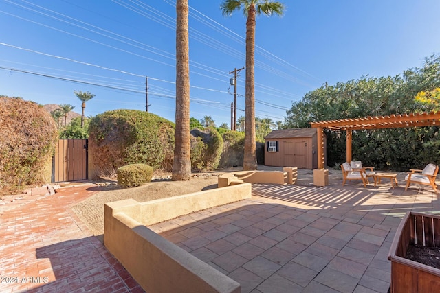 view of patio featuring a storage shed