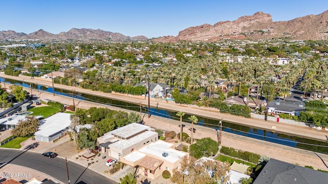 birds eye view of property featuring a mountain view