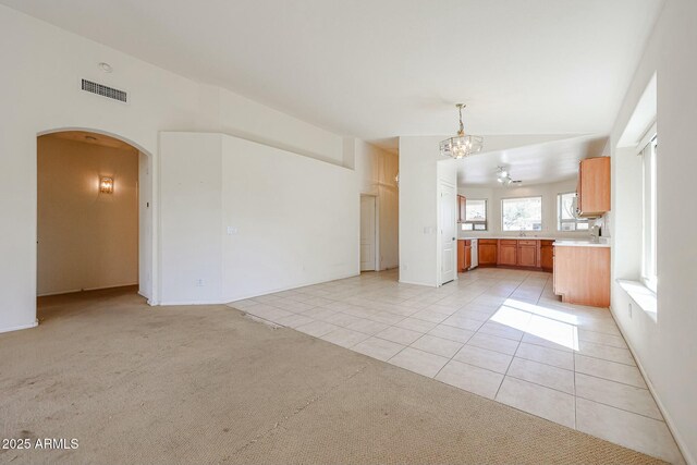 28604 N 21st Ln, Phoenix, AZ 85085 - kitchen featuring light countertops, a chandelier, light carpet, light tile patterned floors, and visible vents
