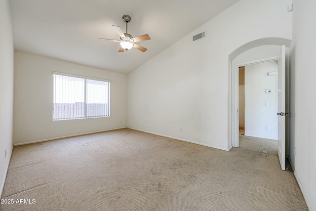 28604 N 21st Ln, Phoenix, AZ 85085 - empty room with lofted ceiling, arched walkways, ceiling fan, and carpet flooring