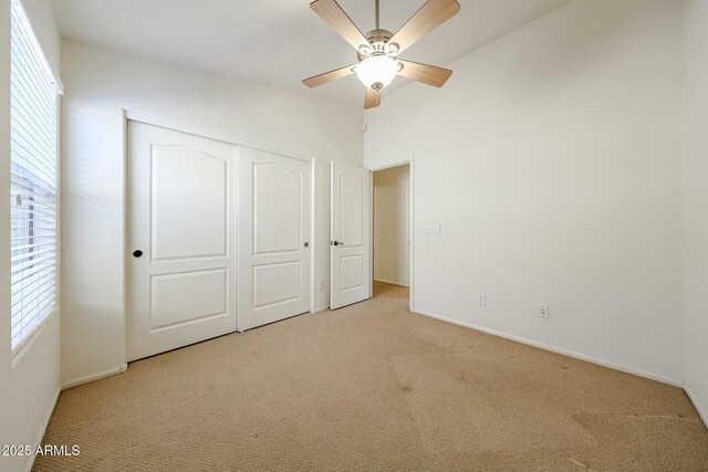 28604 N 21st Ln, Phoenix, AZ 85085 - unfurnished bedroom featuring a closet, carpet flooring, ceiling fan, and baseboards