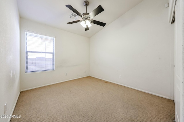 28604 N 21st Ln, Phoenix, AZ 85085 - spare room featuring vaulted ceiling, baseboards, light colored carpet, visible vents, and ceiling fan